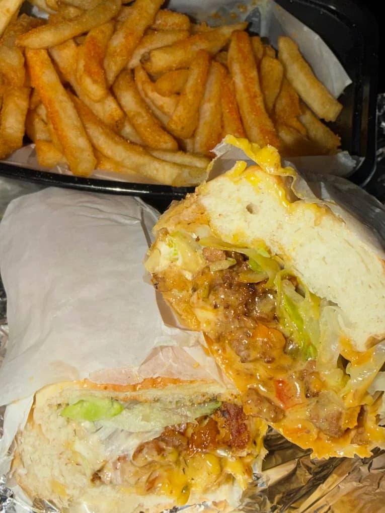 Sam's Deli chopped cheese sandwich with fries